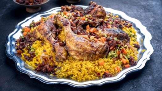 Traditional Omani dish of chicken and rice with fruit