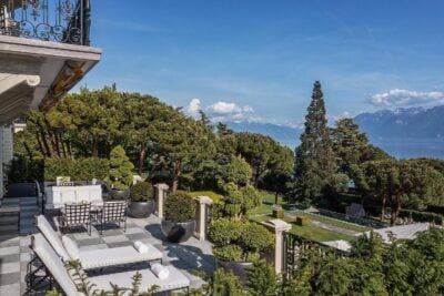 A terrace with garden views at Beau-Rivage Palace, Switzerland