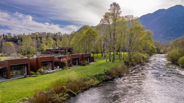 A view of the villas by the river at &Beyond Vira Vira in Chile
