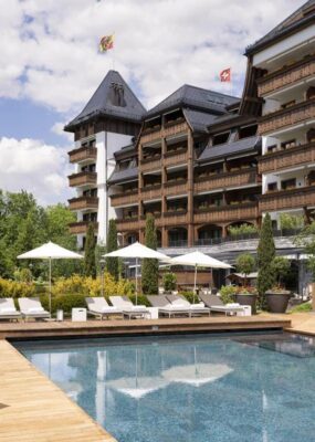 The outdoor pool at The Alpina in Gstaad, Switzerland