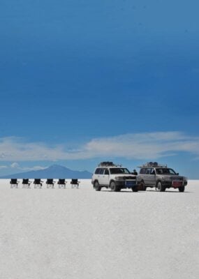 4x4 vehicles on Bolivia's salt flats driving the Travesia route from Atacama to Uyuni