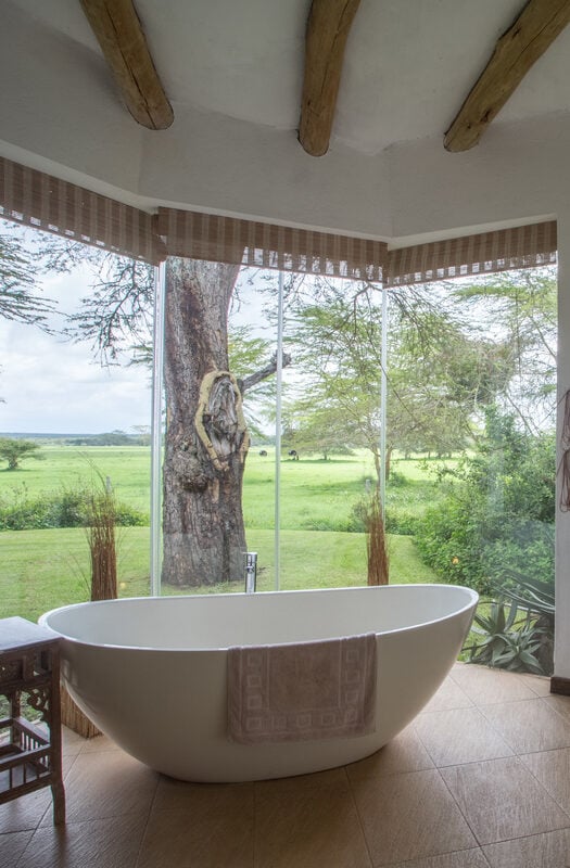 A bathtub overlooking the scenery at Solio Lodge in Kenya