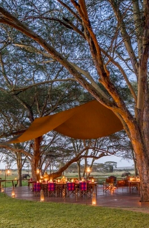 Outdoor dining set up at Sirikoi, Kenya