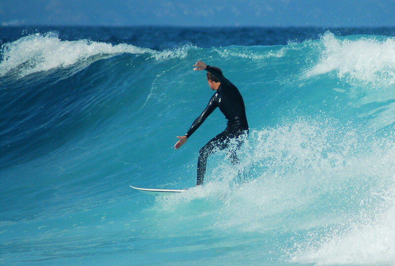 A man surfing in the ocean