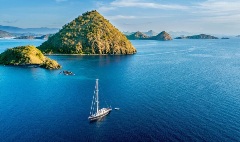 Aerial view of sailboat with island in Labuan Bajo near Bali Island, Indonesia