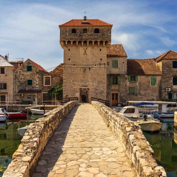 Kastel Gomilica one of seven settlement of town Kastela in Croatia was one of the locations in series Game of Thrones. Historic Kastel Gomilica architecture view near Split, Croatia.