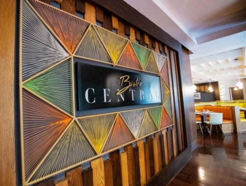 Image of Bistro Central sign on wall at hotel