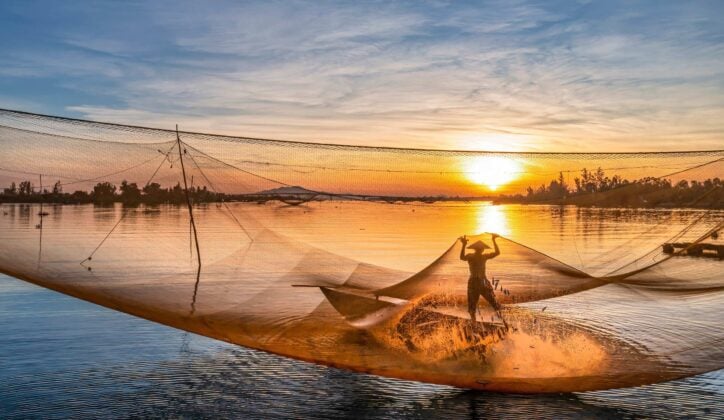 Fishing at sunrise in Vietnam