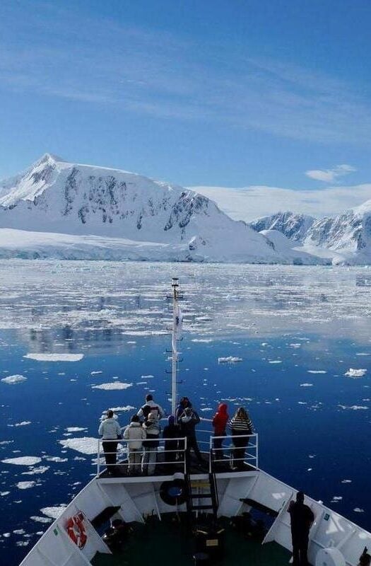 Cruising past icebergs in the Antarctic