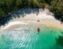 Aerial view of a beach with a small boat in the Gulf of Chiriquí, Panama