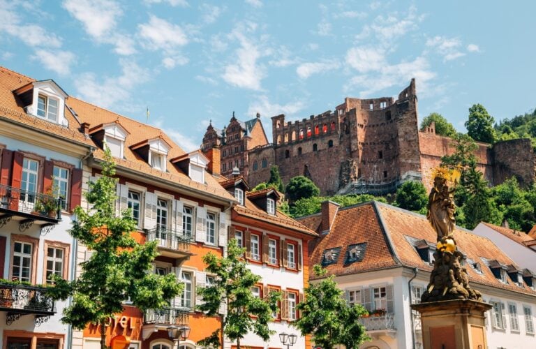 Old town Kornmarkt square and Heidelberg castle in Heidelberg, Germany