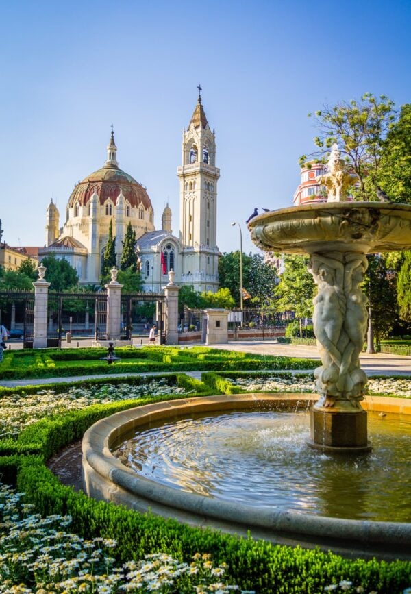 Fountain and mosque in Madrid on a bright sunny day in the summer