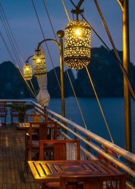 Outdoor lanterns on deck at night on The Violet, Halong Bay, Vietnam