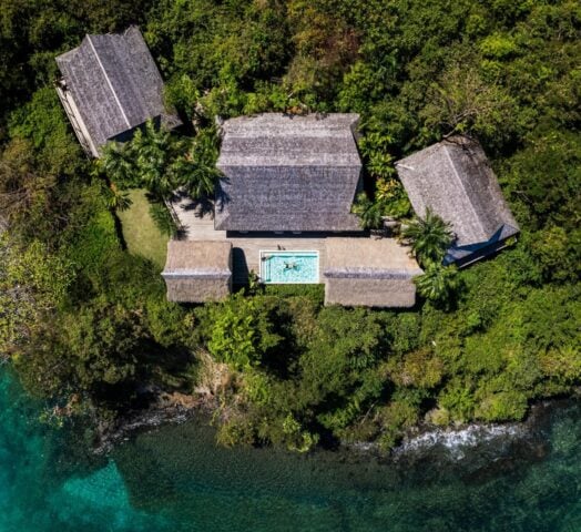 Aerial view of a villa with pool at Islas Secas resort, Panama