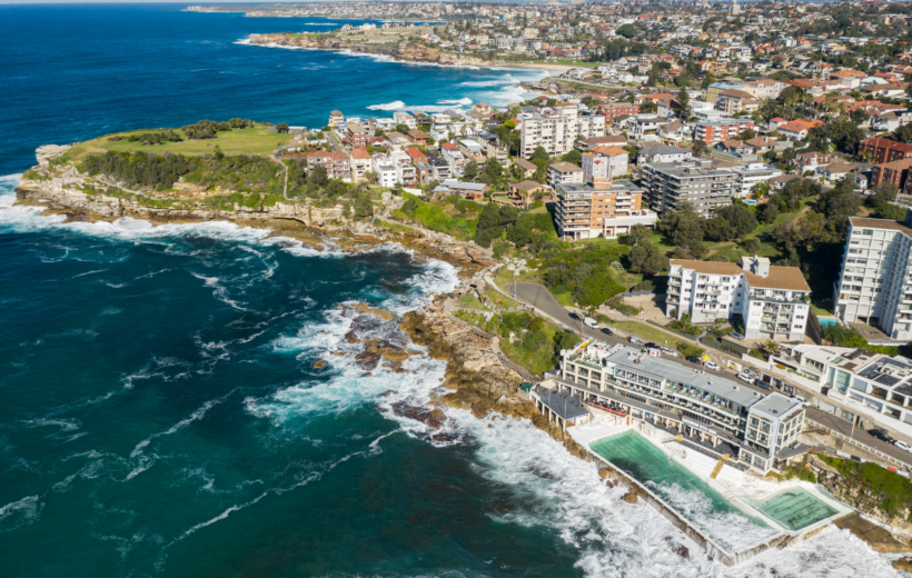 Aerial view of a Sydney suburb by the sea