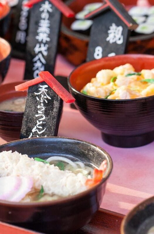 Traditional Japanese food in bowls at a market in Tokyo