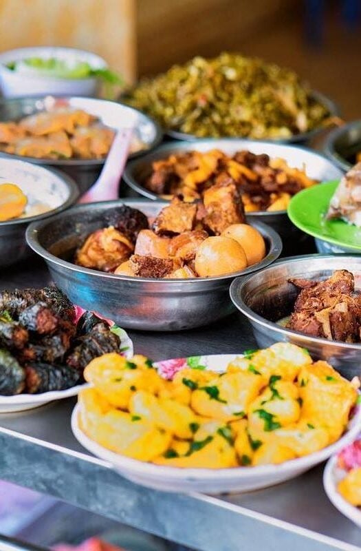 Assortment of dishes at a street food market in Hanoi, Vietnam