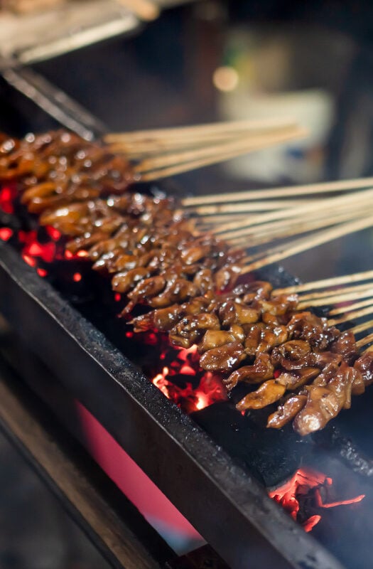 Grilled satay chicken skewers in Malaysia