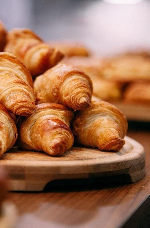 Rows of fresh baked French croissants