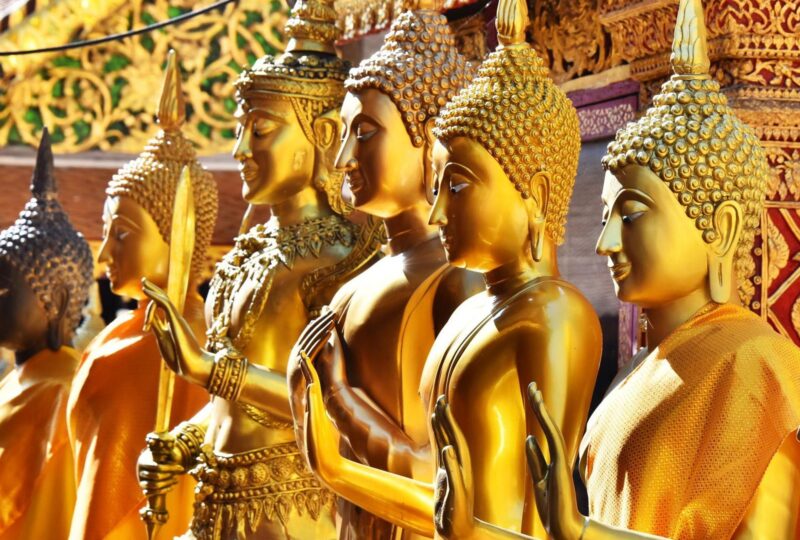 Golden statues at Wat Phra Doi Suthep in Chiang Mai, Thailand