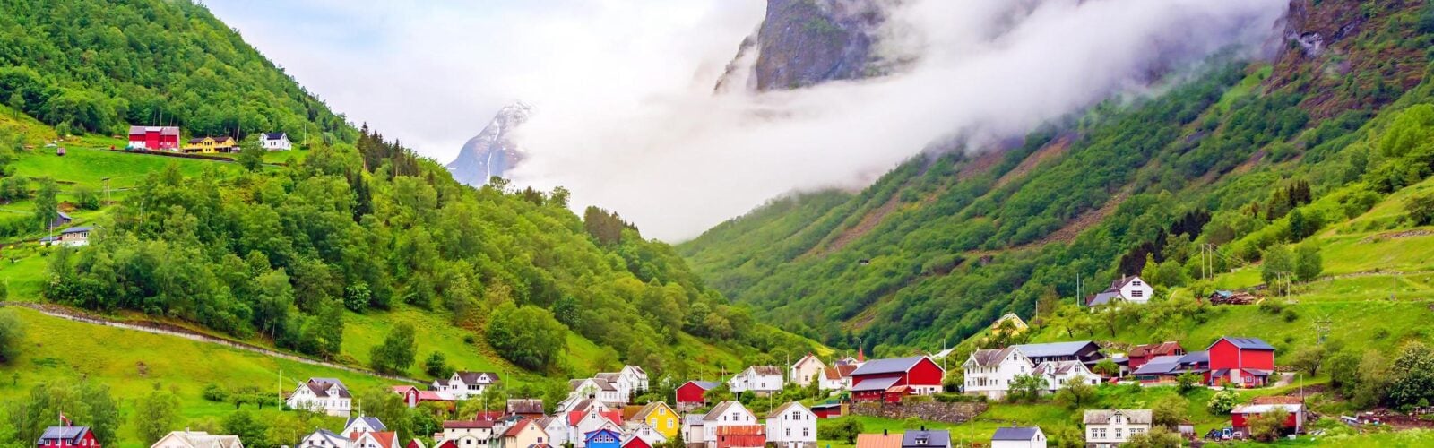 Colourful houses by the edge of a fjord in Norway