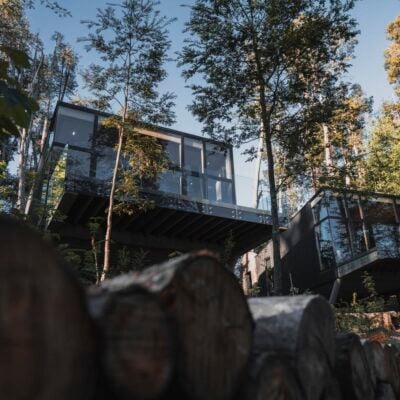 A glass walled villa in the forest at Las Balsas hotel in Argentina