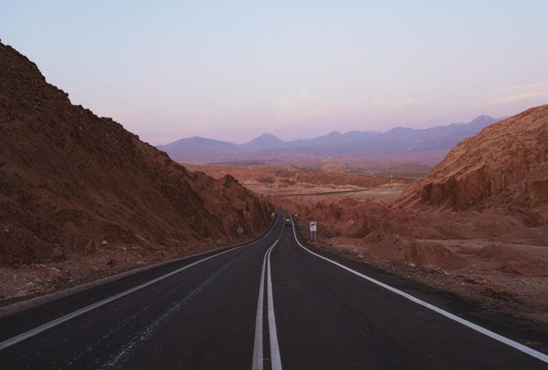 A road through the Atacama Desert at sunset