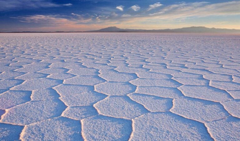 Salt flat Salar de Uyuni in Bolivia at sunrise