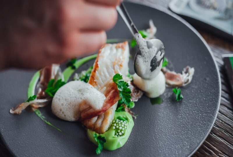 Fish food on plate in michelin star restaurant