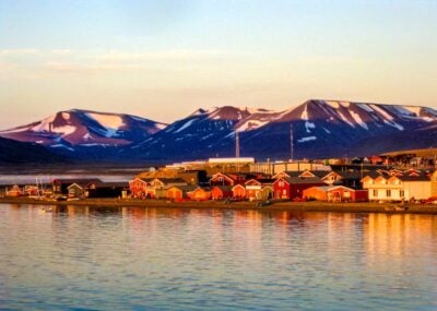 Midnight sun on the Longyearbyen waterfront in Svalbard in the Norwegian arctic