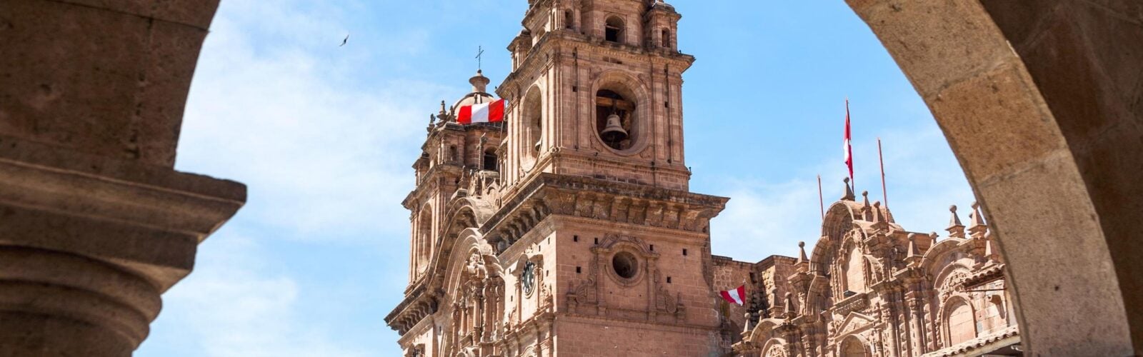 A church in the city of Cusco, Peru, seen through an archway