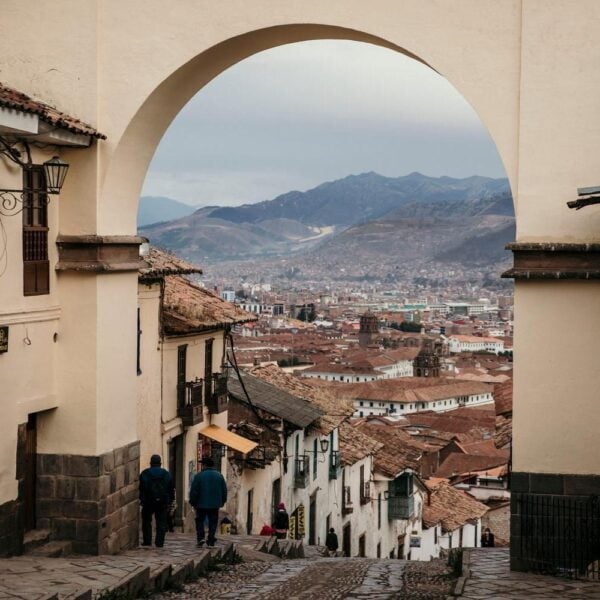 View through an archway overlooking the streets of Cusco