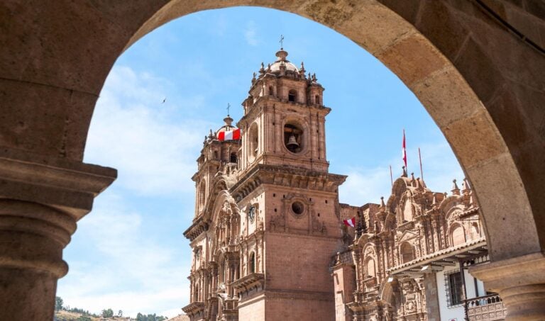 The cathedral in Cusco, Peru viewed through an archway