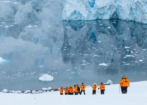 Antarctica cruise group exploring the snowy landscape