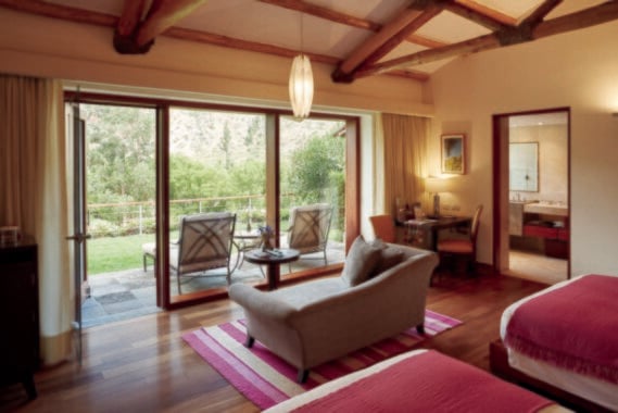 Bedroom with terrace at Belmond Hotel Rio Sagrado, Peru